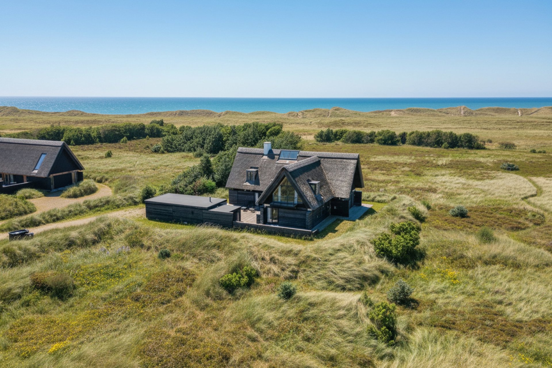 EKSKLUSIV KLITGÅRD VED STRANDEN - EN HYLDEST TIL SKAGENS RÅ NATUR OG DEN NORDISKE ARKITEKTUR